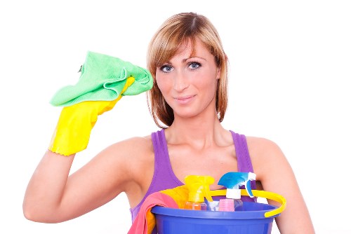 Technician preparing carpet cleaning equipment for a service appointment
