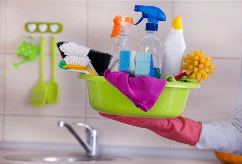 Professional carpet cleaners in Watford treating a living room carpet