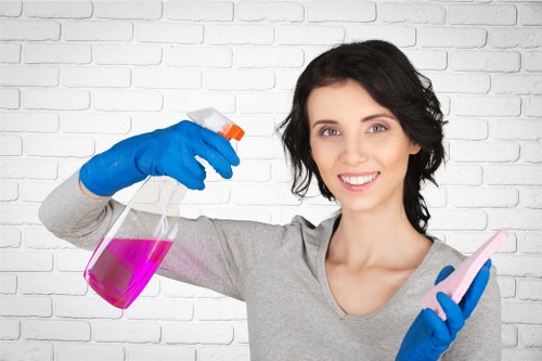 Deep cleaning a living room armchair during upholstery cleaning