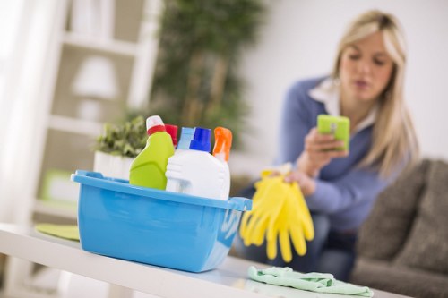 Local stain removal technician assessing a fabric mark